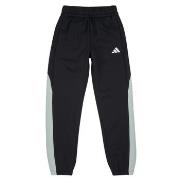 Jogging housut / Ulkoiluvaattee adidas  -  11 / 12 vuotta