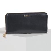 Lompakot Calvin Klein Jeans  CK PULLER LARGE ZIP AROUND  Yksi Koko