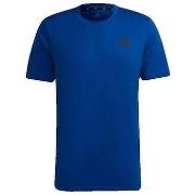 Lyhythihainen t-paita adidas  T-shirt  bleu royal homme fitness  EU S