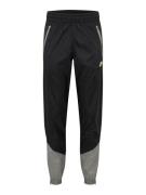 Nike Sportswear Housut  vaaleankeltainen / harmaa / musta