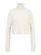 Tommy Jeans Neulepaita  vaaleabeige