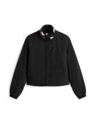 Tommy Jeans Välikausitakki 'ESSENTIAL'  musta