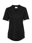 Blouse From Freequent In A Soft Material. The Blouse Has A Simple Silh...