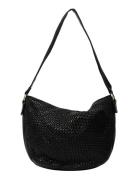 Melle Black RE:DESIGNED EST 2003