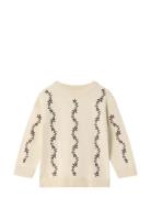 Alon Flower Pullover Cream Fliink