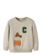 Nmmnotus Ls Nreg Sweat Bru Beige Name It