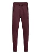 Logo Embroidered Track Pants Burgundy C.P. Company