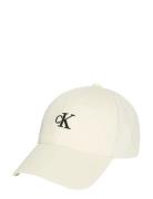 Monogram Embroidery Baseball Cap Cream Calvin Klein