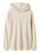 Nlnnizu Ls Bru Sweat W. Hood Noos Cream LMTD