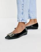 Love Moschino pointed flat shoes with gold hardware in black