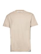 Woven Tab Tee Tops T-shirts Short-sleeved Cream Calvin Klein Jeans
