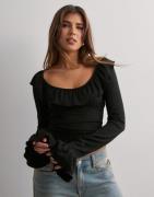 Nelly - Musta - Stunning Frill Blouse Top