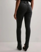 Calvin Klein Jeans - Musta - High Rise Super Skinny