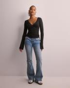 Nelly - Musta - Romance Wrap Top