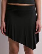 Nelly - Musta - Lovely Asymmetric Skirt
